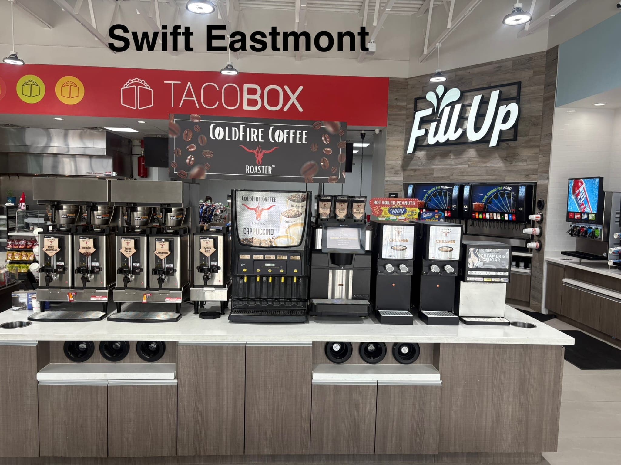 A variety of coffee blends and roasts displayed in a modern cafe environment.